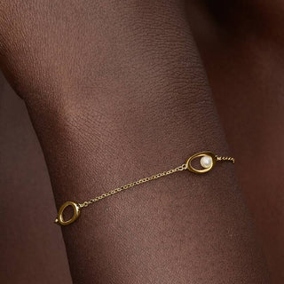 Oval Bracelet with Wavy Line and Cultured Freshwater Pearl