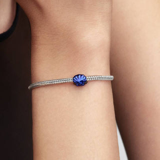 Mini Charm Conchiglia effetto metallico blu
