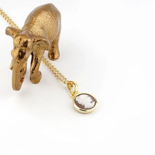Golden Luminous Cameo Face Pendant