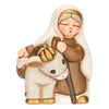 Grandmother with ceramic donkey, Classic Nativity scene